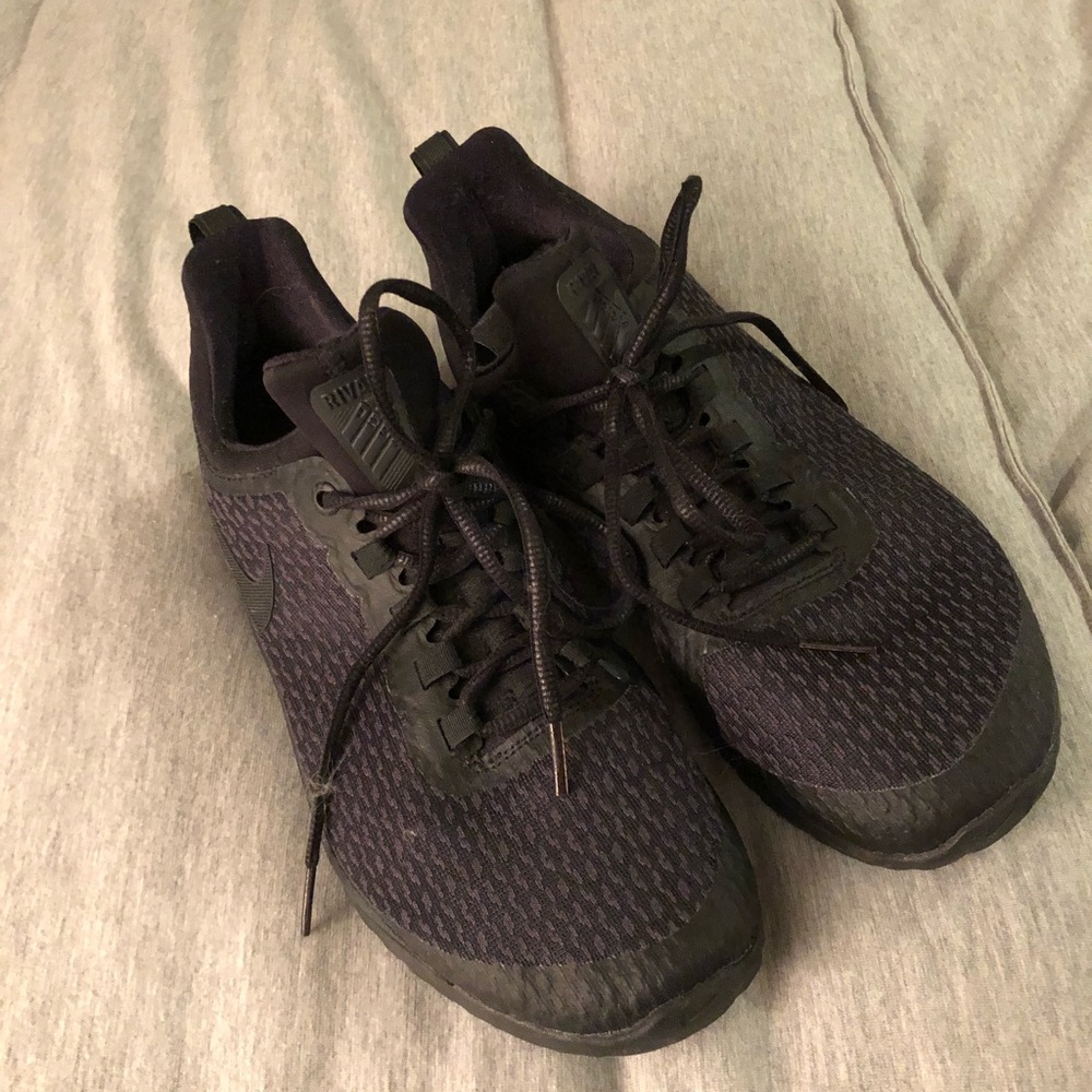 Nike all black ladies sneakers.